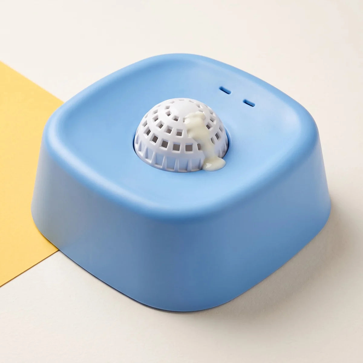 The blue lick bowl and its white ball
